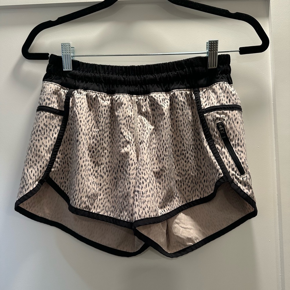 Lululemon athletic shorts. Size: 6. Color: Light pink with black dots